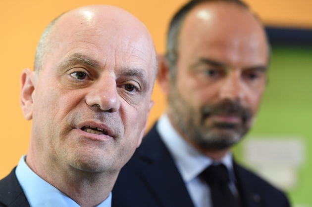 Le Premier ministre Edouard Philippe (d) et le ministre de l'Education Jean-Michel Blanquer (L), le 2 septembre 2019 jour de la rentrée scolaire à Clichy