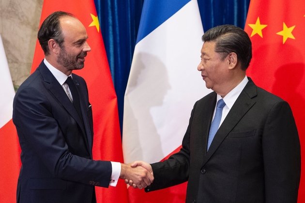 Le Premier ministre français Edouard Philippe et le président chinois Xi Jinping, à Pékin, le 25 juin 2018